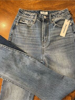 Juicy Couture High waisted two toned flare jeans medium and dark Wash size 27